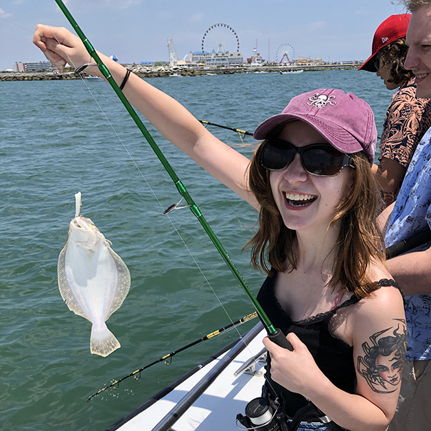 Hope holding a small flounder